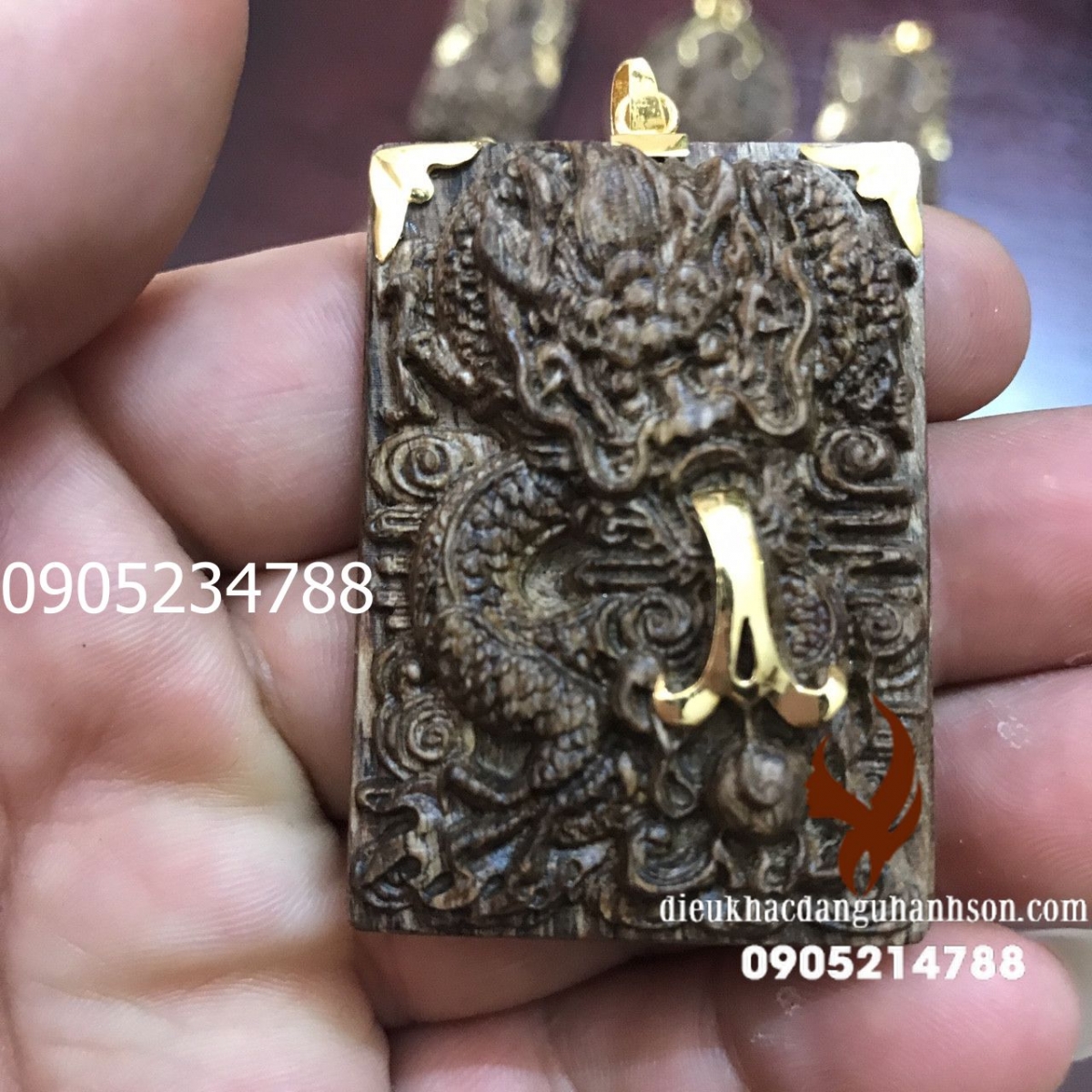 Mặt  rồng trầm tốc tự nhiên viền vàng tây 18k TH11